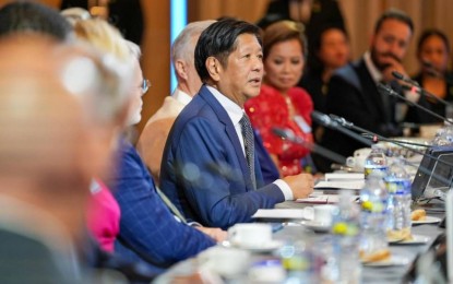 <p><strong>BUSINESS FORUM.</strong> President Ferdinand R. Marcos Jr. delivers a keynote address during the Philippines-United States Business Forum co-hosted by the US- Association of Southeast Asian Nations Business Council and the US Chamber of Commerce in Washington, D.C. on Saturday (April 13, 2024, PH time). In his speech, Marcos emphasized the need to forge a bilateral free trade agreement with the US and the revival of the Generalized System of Preferences Program. <em>(Photo courtesy of PBBM official Facebook)</em></p>