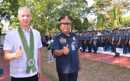 <p>SEND-OFF. Negros Occidental Governor Eugenio Jose Lacson (left) and Col. Rainerio de Chavez, officer-in-charge of the Negros Occidental Police Provincial Office, lead the deployment of security forces for the 2024 Panaad Sa Negros Festival at the police provincial headquarters in Bacolod City on Saturday (April 13, 2024). About 1,102 troops and force multipliers led by the Philippine National Police will secure the festivities on April 15 to 21. (<em>Photo courtesy of Negros Occidental-PIO)</em></p>