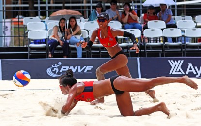 <p><strong>VALIANT EFFORT.</strong> The Philippines' Gen Eslapor (on the ground) and Kly Orillaneda during the recent Smart Asian Volleyball Confederation Beach Tour at Nuvali Sand Courts in Santa Rosa City, Laguna. They lost to New Zealand’s Katie Sadlier and Meile Rose Green, 21-18, 16-21, 15-12, in the Last 16 of the Volleyball World Beach Pro Tour Futures at the same venue on Saturday (April 13, 2024). <em>(Contributed photo)</em></p>