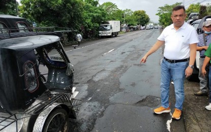 <p><strong>ROAD IMPROVEMENTS.</strong> Albay 3rd District Rep. Fernando Cabredo inspects the Maharlika Highway section in Barangay Tuburan, Ligao City in this undated photo. Cabredo on Monday (April 15, 2024) thanked President Ferdinand R. Marcos Jr. for prioritizing PHP866 million worth of infrastructure projects along the highway in the province of Albay. <em>(Photo from Rep. Cabredo's Facebook page)</em></p>