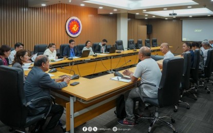 <p><strong>OPEN DISCUSSION</strong>. The Department of Budget and Management, led by Secretary Mina Pangandaman (center, left side), meets with members of the Alliance of Health Workers at the DBM central office in Manila on Friday (April 12, 2024). The DBM and the healthcare workers discussed various concerns and other grievances, including the release of their emergency allowance. (DBM photo)</p>