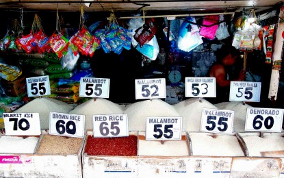 <p><strong>AMPLE SUPPLY.</strong> Several rice varieties are displayed at a stall in Nepa Q-Mart in Cubao, Quezon City on April 11, 2024. The Department of Agriculture on Thursday (May 2, 2024) assured that the country will have sufficient supply of rice for the whole year despite a dip in production in the first quarter of 2024 due to the El Niño phenomenon. <em>(PNA photo by Ben Briones)</em></p>