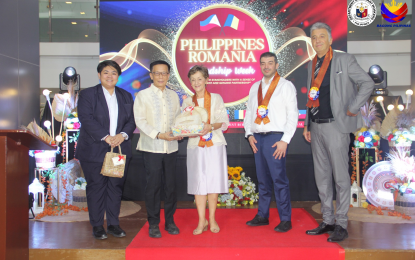 <p><strong>STRONGER LABOR TIES.</strong> The Philippines and Romania kick of the celebration of Friendship Week at the Department of Migrant Workers head office in Mandaluyong City on Tuesday (April 16, 2024). DMW officer-in-charge Hans Leo Cacdac (2nd from left) and Romanian Ambassador to the Philippines Râduta Dana Matache said the two countries are seeking to further strengthen their mutual labor ties to benefit overseas Filipino workers (OFWs) in the southeastern European country. <em>(Photo courtesy of DMW)</em></p>