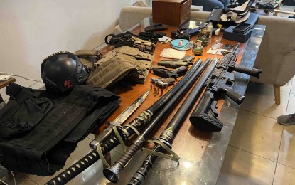 <p><strong>SEIZED.</strong> High-powered firearms and other contraband seized from a search warrant operation by members of the National Capital Region Police Office (NCRPO) in Taguig City on Sunday (April 14, 2024). The NCRPO on Wednesday (April 17) said 24-year-old Haiqiang Su was arrested during the operation. <em>(Photo courtesy of NCRPO)</em></p>