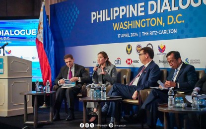 <p><strong>PH DIALOGUE</strong>. Budget Secretary Amenah Pangandaman speaks at the Philippine Dialogue held in Washington DC in the United States on Wednesday (April 17, 2024). During the event, Pangandaman highlighted the Marcos administration's budget priorities and reforms aimed at transforming the Philippine economy into a prime investment hub. <em>(Photo from DBM)</em></p>