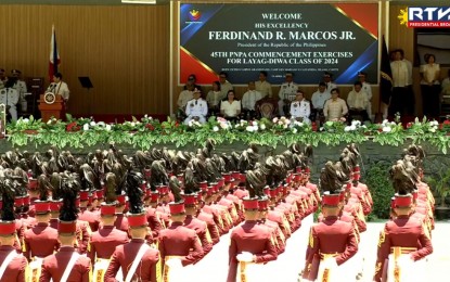 <p><strong>NEW GRADUATES.</strong> President Ferdinand R. Marcos Jr. leads the 45th Philippine National Police Academy commencement exercises for the “Layag-Diwa” Class of 2024 at Camp General Mariano N. Castañeda in Silang, Cavite on Friday (April 19, 2024). In his speech, Marcos urged the PNPA graduates to use technology for smart policing, fire prevention, and penology. <em>(Screenshot from Radio Television Malacañang)</em></p>