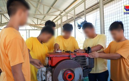 <p><strong>POSITIVE CHANGE.</strong> Children in conflict with the law (CICLs) undergo a 15-day training from March 11-April 3 by the Technical Education and Skills Development Authority (TESDA) in Barangay Roma Norte in Enrile town. Some 25 CICLs in Cagayan Valley have been given a new lease on life after receiving TESDA training certificates on Motorcycle/Small Engine Servicing on April 18, 2024. <em>(Photo courtesy of DSWD)</em></p>