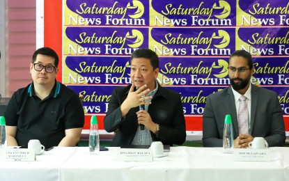<p><strong>SURPLUS COLLECTION.</strong> Bureau of Customs Assistant Commissioner Vincent Philip Maronilla (center) reports the bureau’s PHP8 billion surplus collection for the first quarter of the year, during the Saturday News Forum on April 20, 2024. With him are National Security Council Assistant Director General Jonathan Malaya (left) and De La Salle University geopolitical analyst and lecturer Don McLain Gill. <em>(PNA photo by Robert Oswald P. Alfiler)</em></p>