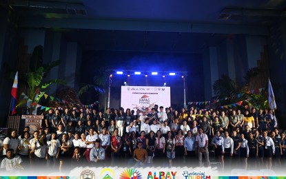 <p><strong>FOOD TOURISM</strong>. More than 200 culinary students in Albay pose for a photo during the opening of the two-day "Hapag ng Pamana' Food Festival on Monday (April 22, 2024) at Albay Astrodome in Legazpi City. The activity is part of the celebration of Filipino Food Month this April to promote food tourism and preserve the identity of Albayanos through cooking.<em> (Photo courtesy of PTCAO-Albay)</em></p>