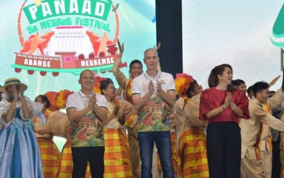 <p><strong>CULMINATION NIGHT.</strong> Negros Occidental Governor Eugenio Jose Lacson (2nd from right) with Provincial Administrator Rayfrando Diaz II (2nd from left) and Provincial Tourism Officer Cheryl Decena (right) during the culmination program of the 28th Panaad Sa Negros Festival at the Panaad Park and Stadium in Bacolod City Sunday night (April 21, 2024). The sales of local government units and other sellers totaled PHP19.25 million from April 15 to 21. <em>(Photo courtesy of PIO Negros Occidental)</em></p>