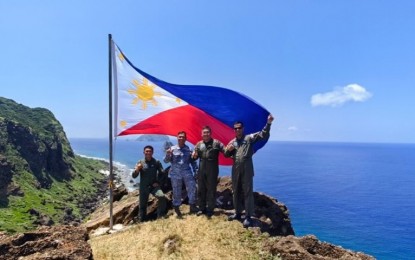 <p><strong>BOOSTING DEFENSE.</strong> Armed Forces of the Philippines (AFP) officials pose at one of the country's naval detachments in Batanes province on Monday (April 22, 2024). The AFP on Tuesday (April 23) said it has installed high-tech Harris radios in its naval detachments located in Mavulis, Fuga, and Calayan Islands, significantly enhancing communication capabilities across the country's northernmost province of Batanes. <em>(Photo courtesy of Nolcom)</em></p>
