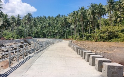 <p><strong>SLOPE PROTECTION</strong>. The new 500-linear meter slope protection with a road dike worth PHP96.4 million in Manito, Albay. The Department of Public Works and Highways Albay 2nd District Engineering Office said the project is benefiting residents who are mostly producers of lasa grass—the material used to make soft brooms. <em>(Photo courtesy of DPWH 2DEO)</em></p>