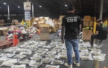 <p><strong>BUSTED.</strong> Agents of the CIIS-MICP account for kush or dried marijuana found in a shipment declared as household items, shoes, and motor parts from Thailand during an inspection on Wednesday (April 24, 2024). The contraband with an estimated street value of PHP29.5 million was found in an illegal shipment. <em>(Photo courtesy of BOC)</em></p>