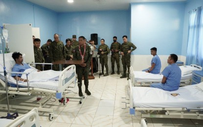 <p><strong>HEROES.</strong> AFP chief, Gen. Romeo Brawner Jr., on Wednesday (April 24, 2024) visits soldiers wounded in the April 22 clash that killed ranking Bangsamoro Islamic Freedom Fighters (BIFF) leader Mohiden Alimodin Animbang also known as Kagi Karialan. Also slain in the clash were 11 other BIFF members.<em> (Photo courtesy of the AFP)</em></p>