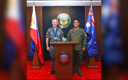 <p><strong>PROMOTING REGIONAL STABILITY.</strong> Acting AFP deputy chief of staff Lt. Gen. Steve Crespillo (right) and ADF deputy chief of joint operations Rear Admiral Justin Garred Jones pose for a photo during the latter's courtesy visit on Friday (April 26, 2024) at the AFP headquarters in Camp Aguinaldo, Quezon City. Crespillo thanked Australia for promoting regional stability and security. <em>(Photo courtesy of AFP)</em></p>