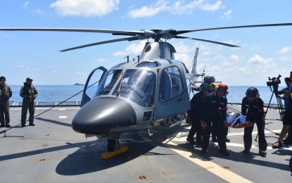 <p><strong>MULTILATERAL MARITIME EXERCISE.</strong> The BRP Davao Del Sur (LD-602) conducting flight quarters operation to receive AW-109 helicopter with tail number (NH-434) and subsequently performing simulated medical and casualty evacuation exercises as part of the Balikatan's multilateral maritime exercises on Friday (April 26, 2024). The drills started April 25 and will end on April 29. <em>(Photo courtesy of AFP Western Command)</em></p>