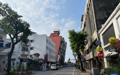 <p>Residential building on a street in Hualien, Taiwan tilts after a 7.2 earthquake on April 3, 2024. <em>(Xinhua)</em></p>