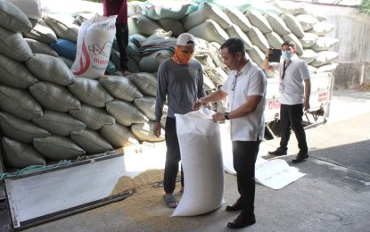 <p><strong>MORE STOCKS.</strong> National Food Authority Officer-in-Charge Administrator Larry Lacson visits NFA warehouses and talks to local farmers in Bulacan, Tarlac, and Nueva Ecija provinces on April 24, 2024. Lacson reported more palay (unhusked rice) procurement shortly after the implementation of a new and higher buying price. <em>(Photo courtesy of NFA)</em></p>