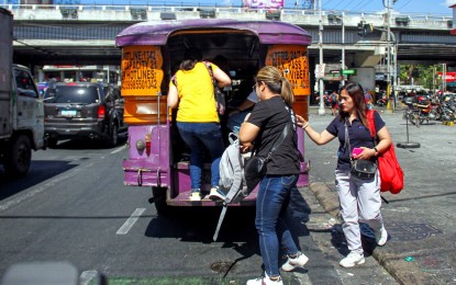 <p><strong>STRIKE OUT</strong>. A traditional jeepney picks up passengers in Quezon City on Monday (April 29, 2024). Orlando Marquez, Sr., national president of the Liga ng Transportasyon at Operators sa Pilipinas, said the protest against the government modernization program scheduled Monday to Wednesday (May 1) is likely to fizzle out. <em>(PNA photo by Robert Oswald Alfiler)</em></p>