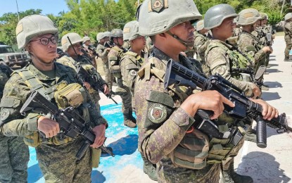 <p><strong>NO TROOP WITHDRAWAL</strong>. Soldiers of the Philippine Army's 11th Infantry Battalion based in Siaton, Negros Oriental, stand in attention during a formation in this undated photo. The Philippine Army said on Tuesday (April 30, 2024) that it would not withdraw its forces from the province despite its declaration as under a state of Stable Internal Peace and Security. <em>(PNA file photo by Mary Judaline Partlow)</em></p>