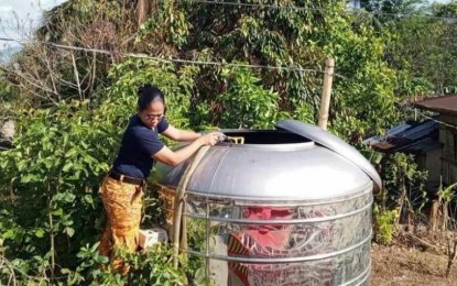 <p><strong>WATER RATIONING.</strong> The Bureau of Fire Protection (BFP) fills up the water tank of a household in Barangay Lacaron, Sibalom, during its water rationing on Monday (April 29, 2024). Engineer Jonathan De Gracia, Sibalom Water District Manager, in an interview on Tuesday (April 30, 2024) assured their concessionaires that there is still enough water for drinking and household needs despite the ongoing water rationing<em>.(Photo courtesy of BFP Sibalom)</em></p>