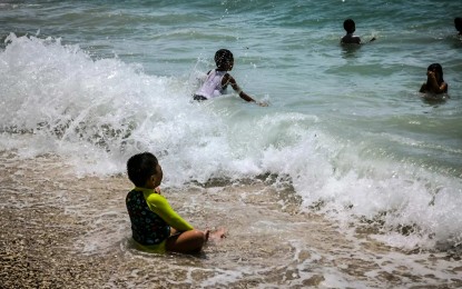 <p><strong>WATER BABIES.</strong> Children enjoy a no-class day at Cantaan white beach in Guinsiliban, Camiguin on May 1, 2024. Thirty-seven areas are forecast to experience danger level heat indices on Tuesday (May 7, 2024), with the highest at 45 degrees likely in Dagupan City, Pangasinan. <em>(PNA photo by Joan Bondoc)</em></p>