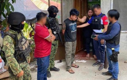 <p><strong>NPA ARRESTED.</strong> Authorities arrest Romulo Micabalo, an alleged leader of the New People's Army Regional Guerilla Unit-Eastern Visayas, in Barangay Pitogo, Consolacion town in Cebu on April 8, 2024. Visayas Command commander Lt. Gen. Fernando Reyeg on Thursday (May 2) said NPA suffered a huge setback as the military in central Philippine regions neutralized 40 of their members, including Micabalo, during last month’s operations. (<em>Photo courtesy of Viscom PIO)</em></p>