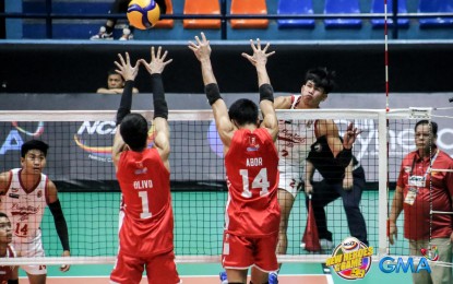 <p><strong>POINT.</strong> Perpetual Help's Jefferson Marapoc tries to score against Emilio Aguinaldo College's Joshua Olivo (No. 1) and Jan Ruther Abor (No. 14) in the NCAA Season 99 men’s volleyball tournament at Filoil EcoOil Centre in San Juan on Sunday (May 5, 2024). The Altas won, 25-23, 25-23, 25-23, to sweep the elimination round and secure a finals berth. <em>(NCAA photo)</em></p>