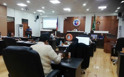 <p><strong>PROBE ON DELAYED SALARY</strong>. Antique Provincial Board Member Rony Molina (standing left) delivers a privilege speech during their regular session on Monday (May 6, 2024) at the Legislative Building in San Jose de Buenavista. He said his office had received numerous complaints about the delay in the payment for the contract of service (COS) workers. (<em>PNA by Annabel Consuelo J. Petinglay)</em></p>