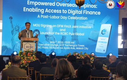 <p><strong>FINANCIAL LITERACY.</strong> Secretary Hans Leo Cacdac speaks during the memorandum of understanding signing between the Department of Migrant Workers and Rizal Commercial Banking Corporation in Makati City on Tuesday (May 7, 2024). The partnership will come up with collaborative programs for the financial education and digital literacy of overseas Filipino workers and their families. <em>(Photo courtesy of DMW)</em></p>
