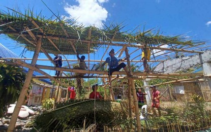 <p><strong>ECOTOURISM DESTINATION.</strong> Bantay Gubat (Forest Guardian) volunteers put up makeshift reception and orientation facility out of bamboo and coconut leaves at Sibalom Natural Park in Antique province on April 30, 2024. Joery Oczon, the protected area’s deputy superintendent, said in an interview Tuesday (May 7) that the park will now be an ecotourism destination. <em>(Photo courtesy of Sibalom Natural Park)</em></p>