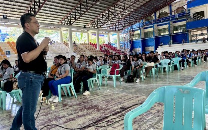 <p><strong>VOTER EDUCATION.</strong> Chairman George Erwin Garcia of the Commission on Elections addresses students at the Negros Oriental State University in Dumaguete City, Negros Oriental on Wednesday (May 8, 2024). He urged them to avail of onsite regular voter registration and the poll body's Register Anywhere Program.<em> (PNA photo by Mary Judaline Flores Partlow)</em></p>