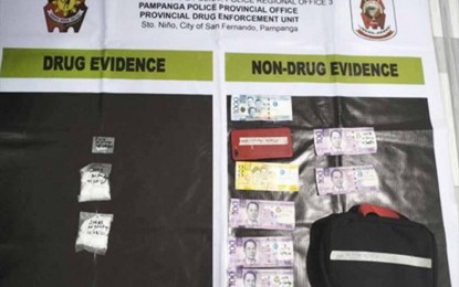 <p><strong>EVIDENCE</strong>. The suspected shabu and money seized during an anti-illegal drug operation in Barangay Lourdes Lauc Pao, Lubao, Pampanga on Wednesday (May 8, 2024). The operation was conducted in coordination with the Philippine Drug Enforcement Agency-Region 3. <em>(Photo courtesy of PRO3)</em></p>