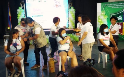 <p><strong>CERVICAL CANCER PROTECTION</strong>. Girls aged nine to 14 avail of the free human papillomavirus (HPV) vaccines at the Almendras Gym in Davao City during the Cervical Cancer Consciousness Month celebration on Thursday (May 9, 2024). The HPV is given as protection from cervical cancer.<em> (PNA photo by Robinson Niñal Jr.)</em></p>