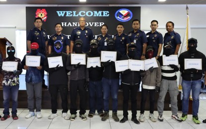 <p><strong>REWARD.</strong> A total of 10 informants received reward from the PNP in simple rites in Camp Crame, Quezon City on Thursday (May 9, 2024). The informants' tips resulted in the arrest of 11 most wanted persons involved in serious crimes such as murder, rape, robbery, and carnapping. <em>(Photo courtesy PNP-PIO)</em></p>