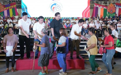 <p><strong>DIRECT AID TO THE PEOPLE.</strong> House Speaker Martin Romualdez (in blue polo shirt) leads the distribution of various form of assistance from the various government agencies during the opening of the Bagong Pilipinas Serbisyo Fair (BPSF) at the Zamboanga City Coliseum in Zamboanga City on Friday (May 10, 2024). The two-day service caravan is expected to deliver PHP580 million worth of government services and assistance to around 111,000 beneficiaries. <em>(Photo courtesy of Speaker Romualdez’s office)</em></p>