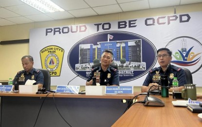 <p><strong>INTERNAL CLEANSING.</strong> Metro Manila top cop Maj. Gen. Jose Melencio Nartatez Jr. (middle), in a press briefing in Camp Karingal on Friday (May 10, 2024), announced that 472 erring cops of assigned in NCRPO has been dismissed from the service due to administrative cases. Nartatez said most of the dismissed cops were axed for being absent without official leave. <em>(PNA photo by Lloyd Caliwan)</em></p>