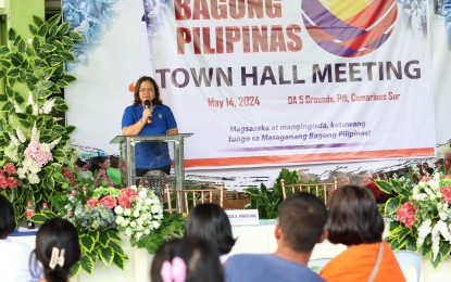 <p><strong>TOWN HALL MEETING</strong>. Lovella Guarin, Department of Agriculture 5 (Bicol) Regional Agriculture and Fisheries Information Section chief, gives her message during the Bagong Pilipinas Town Hall meeting at the DA-5 office in Pili, Camarines Sur on Tuesday (May 14, 2024). More than 250 farmers, farm leaders, and agricultural extension workers attended the event<em>. (Photo courtesy of DA-5)</em></p>