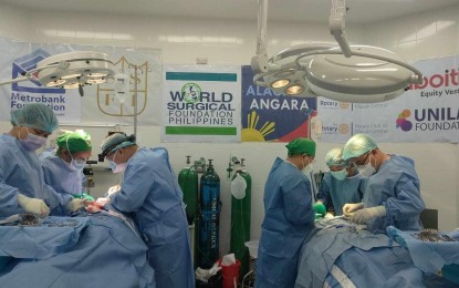 <p><strong>SURGICAL MISSION</strong>. Volunteer surgeons perform a procedure on a beneficiary-patient at the Aurora Memorial Hospital in Baler, Aurora province on Thursday (May 16, 2024). Governor Reynante Tolentino said the medical mission is part of his commitment to provide vital medical services to those in need in collaboration with Senator Sonny Angara, Aurora Rep. Rommel Rico Angara and their partner agencies and organizations. <em>(Photo by Jason de Asis)</em></p>