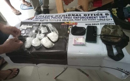 <p><strong>DRUG BUST</strong>. Joint agents of the Regional Police Drug Enforcement Unit and the Philippine Drug Enforcement Agency arrest two suspects and seize PHP2.8 million worth of shabu during a buy-bust at a residential subdivision in Barangay Tangub, Bacolod City on Thursday afternoon (May 16, 2024). Brig. Gen. Jack Wanky, regional director of Police Regional Office-Western Visayas, directed operatives to sustain the anti-illegal drugs campaign in the region. (<em>Photo courtesy of Bacolod City Police Office)</em></p>