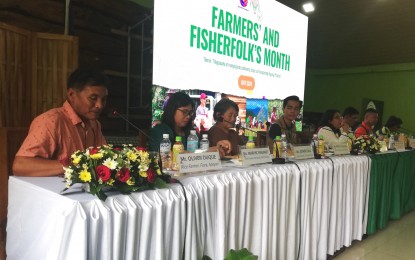 <p><strong>NOT POOR</strong>. Oliver Duque (leftmost) and Marivic Raganit (second from left) said they are not poor despite being farmers in Cordillera. In a press conference during the Farmers and Fisherfolks Month celebration on Monday (May 20, 2024) at the Department of Agriculture regional office in Baguio City, they said their dedication to farming and the support being extended by various government agencies have allowed them to improve their lives. <em>(PNA photo by Liza T. Agoot)</em></p>