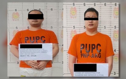 <p><strong>NABBED.</strong> Two Chinese nationals with aliases 'Mike' and 'Bong' were arrested for the alleged kidnapping of their compatriot in Pasay City on May 19, 2024. The Philippine National Police Anti-Kidnapping Group (PNP-AKG) on Wednesday (May 22) reported that the 30-year-old victim was safely rescued. <em>(Photo courtesy of PNP-AKG)</em></p>