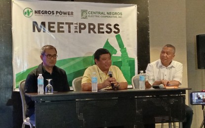 <p><strong>NEW POWER DISTRIBUTOR</strong>. Roel Castro (center), president and chief executive officer of Negros Electric Power Corp., with National Electrification Administration project supervisor Vic Alvaro (left) and Central Negros Electric Cooperative general manager Arnel Lapore during a press conference at Park Inn Bacolod Tuesday night (May 21, 2024). “The earliest would be about a month and a half, the fastest from today. (It) could go to about three months,” Castro said, referring to the official start of their operation. <em>(PNA photo by Nanette L. Guadalquiver)</em></p>