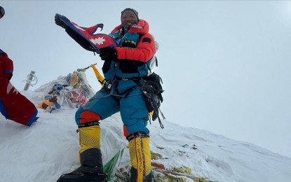 Nepali guide climbs Mt. Everest for record 30th time