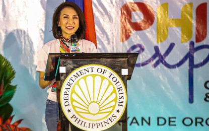 <p><strong>PH EXPERIENCE.</strong> Tourism Secretary Christina Frasco delivers her remarks during the launch of the PH Experience Program: Northern Mindanao leg in Cagayan de Oro on Thursday (May 23, 2024). In an interview, Frasco said the United States’ decision to lower its travel alert in four key Mindanao destinations would encourage tourists from all over the world to visit and see for themselves that Mindanao is safe and a wonderful place for any type of traveler. <em>(PNA photo by Robert Oswald P. Alfiler)</em></p>