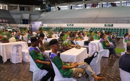 <p><strong>INSURANCE CARAVAN</strong>. Farmers attend the first high value crops insurance caravan on Thursday (May 23, 2024) at the Laoag Centennial Arena. The Department of Environment and Natural Resources and the Philippine Crop Insurance Corporation target to provide insurance policy to around 70 accredited peoples' organizations in the province. <em>(Photo courtesy of DENR-Ilocos Region)</em></p>