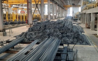<p><strong>PH-MADE REBARS</strong>. Reinforcement bars, or rebars, manufactured by SteelAsia Manufacturing Corp. in its production plant in Compostela, Cebu are shown in this photo taken on Thursday (May 23, 2024). SteelAsia has been exporting to Canada with shipments amounting to about PHP8 billion to date. <em>(PNA photo by Kris M. Crismundo)</em></p>