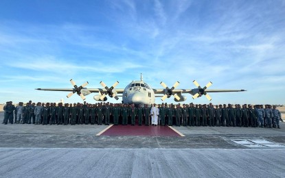 <p><strong>ADDITIONAL ASSET.</strong> Philippine Air Force (PAF) personnel pose for a photo with the newly blessed C-130H aircraft at the Brig. Gen. Benito N. Ebuen Air Base, Lapu-Lapu City, Cebu on Thursday (May 23, 2024). The PAF on Friday (May 24) said the aircraft is one of the two C-130H transport acquired from the United States under the Excess Defense Article Program in 2016. <em>(Photo courtesy of the PAF)</em></p>