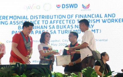 Davao Oriental tourism workers receive P9-K each from DOT, DSWD