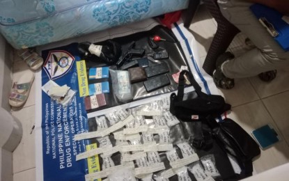 <p><strong>SEIZED.</strong> Authorities account for evidence during a buy-bust operation inside a hotel in Barangay Balogo, Pigcawayan, North Cotabato province early Tuesday (May 28, 2024). Three suspects, including a drug high-value target, were arrested in the operation. <em>(Photo courtesy of PNP Drug Enforcement Group)</em></p>